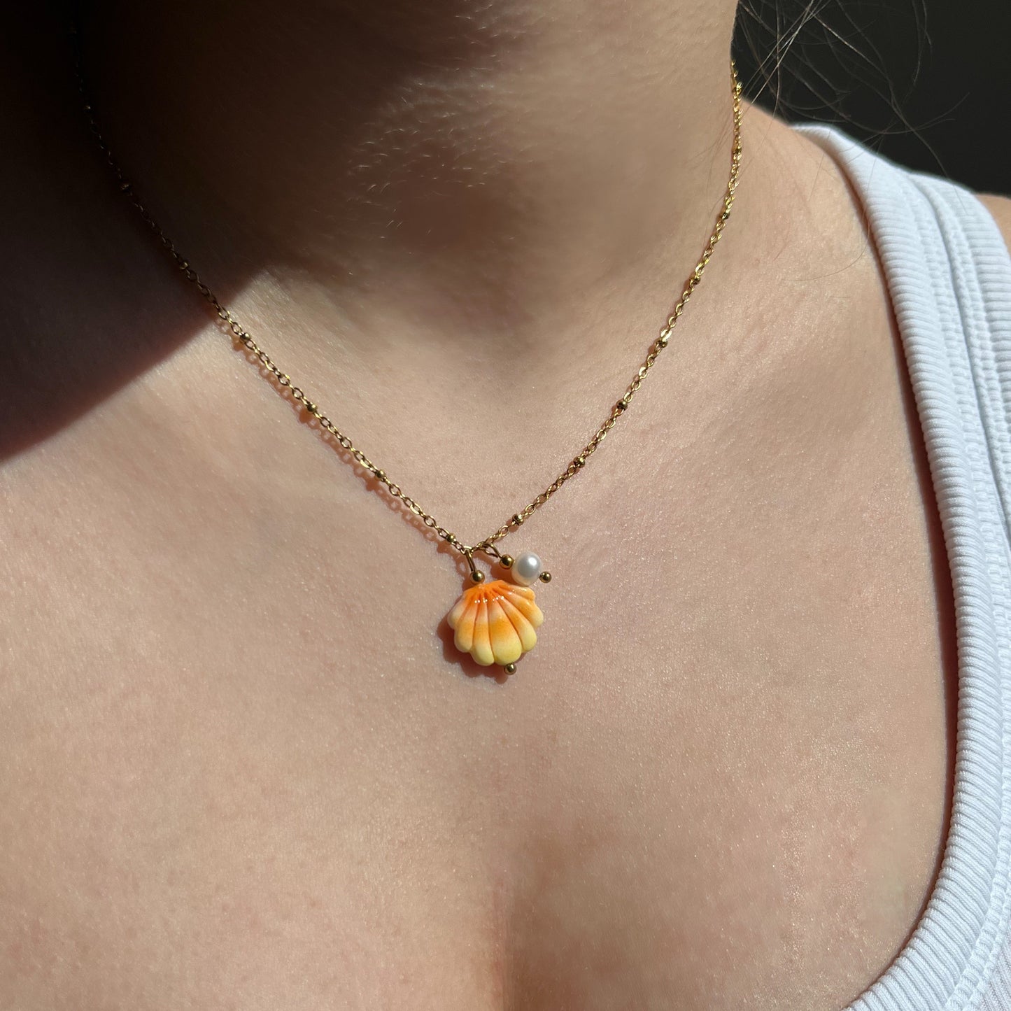 Collier coquillage et perle d'eau douce